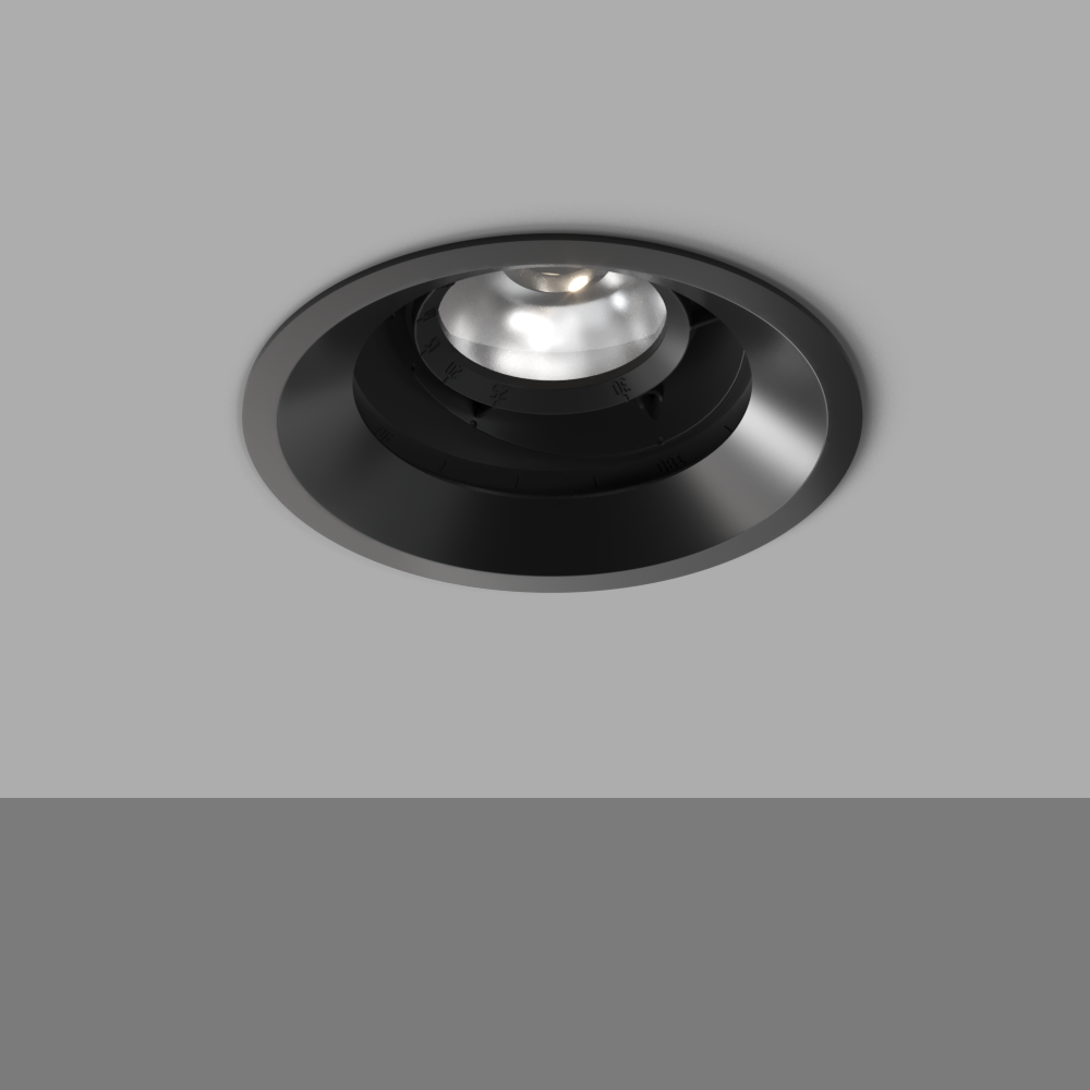  A sleek black downlight emitting a soft, warm white light, perfect for modern interior spaces.
