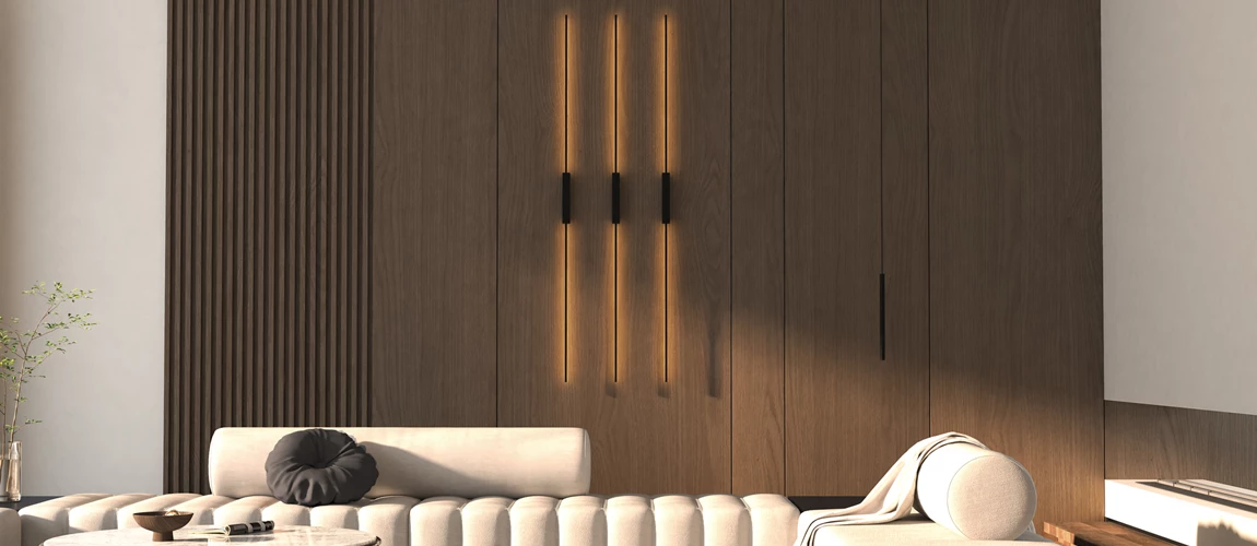 Modern living room with a white couch, wooden paneled wall, and sleek vertical lights.